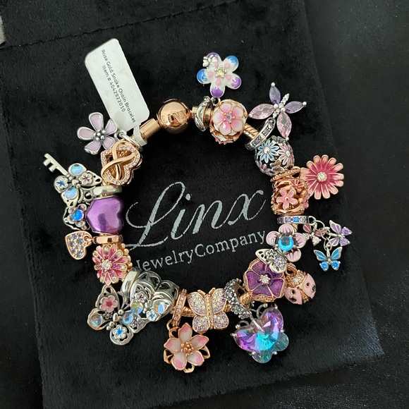 Linx Rose Gold Bracelet with Rose Gold and Iridescent Themed Charms